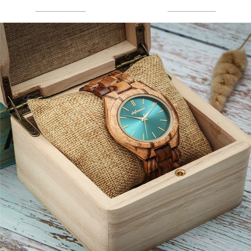 Quartz watch made of wood and steel buckle